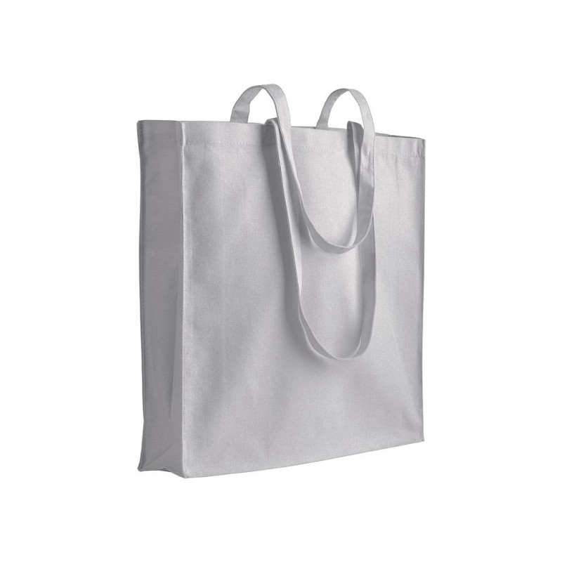 Bolsa de algodón con fuelle e asas largas.