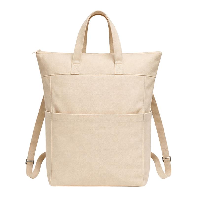 Mochila de algodon 340 g/m2. Asas cortas y dos bolsillos laterales portabotellas