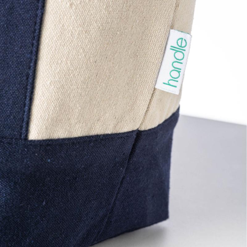 Mini bolsa shopper de algodón reciclado de 340 g/m2 con asas y base de color. GRS