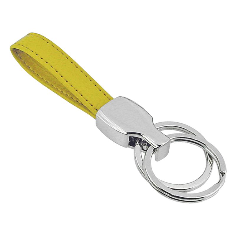 Llavero de metal con tira de polipiel.