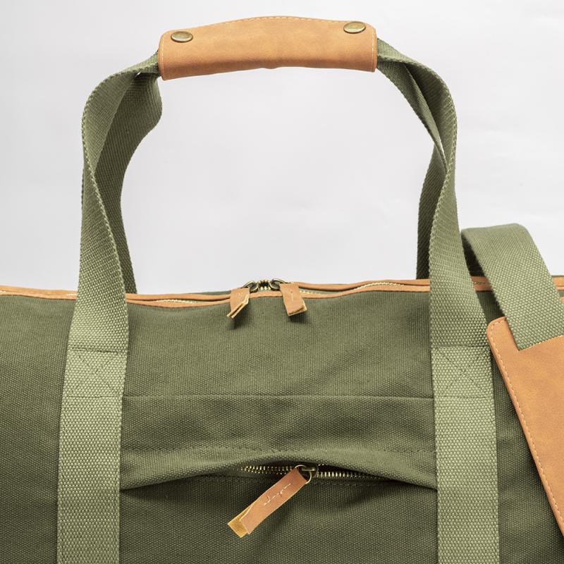 Bolsa de lona reciclada. Correa de hombro ajustable y extraíble con hebillas metálicas